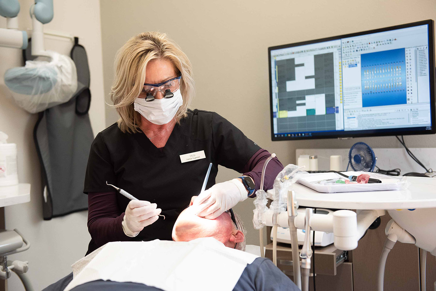 A dentist using a gentle