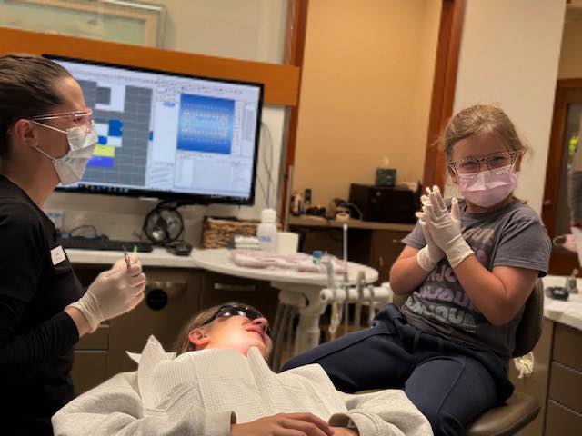 A child receiving a dental treatment.